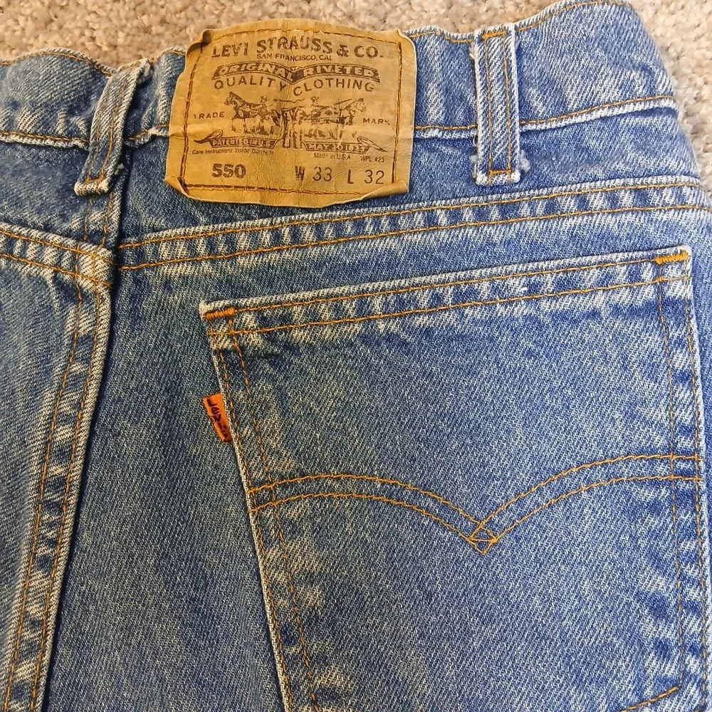 Vintage Levis 550 Orange Tab Mens 33x32 Made in USA Relaxed Tapered Jeans Blue